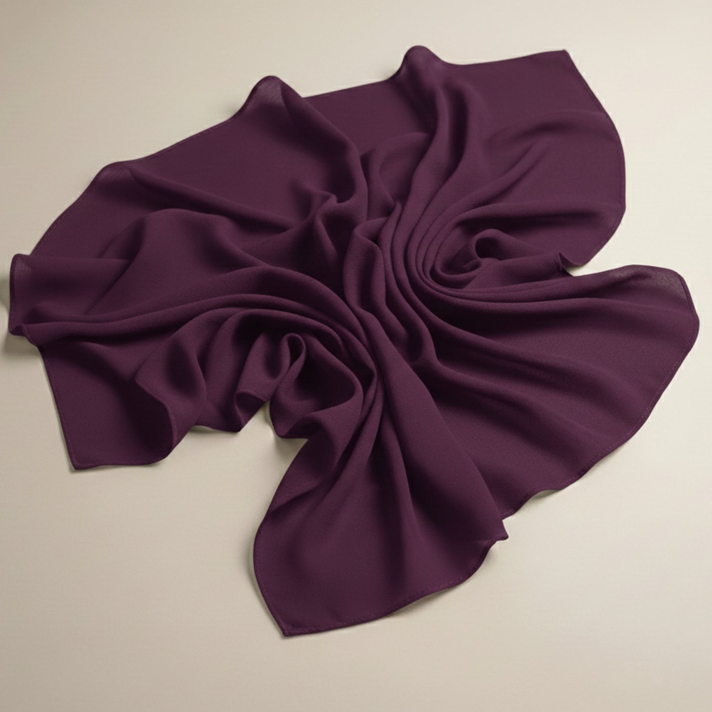 Aubergine georgette hijab fabric flat lay highlighting airy premium texture