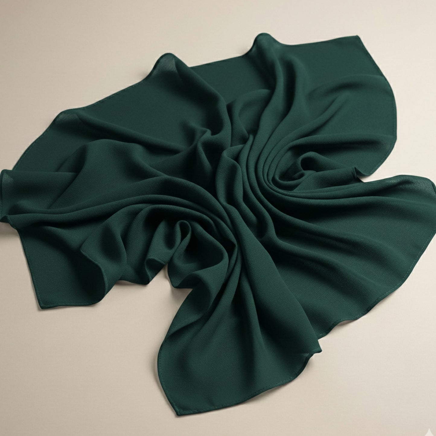 Bottle green georgette hijab fabric laid flat showcasing breathable texture