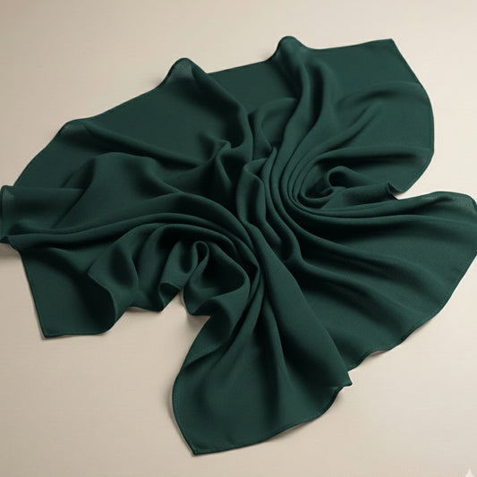 Bottle green georgette hijab fabric laid flat showcasing breathable texture