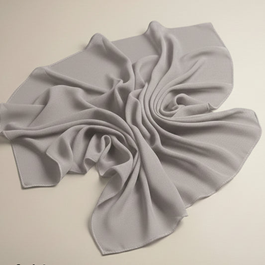 Slate gray georgette hijab fabric laid flat showcasing airy drape