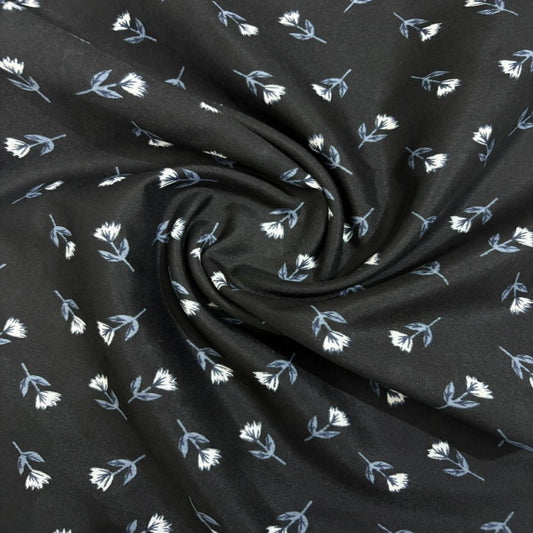 Black fabric with small white floral patterns