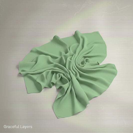 Mint georgette hijab fabric laid flat with soft folds, highlighting breathable texture, lightweight feel, and premium modest wear quality.”