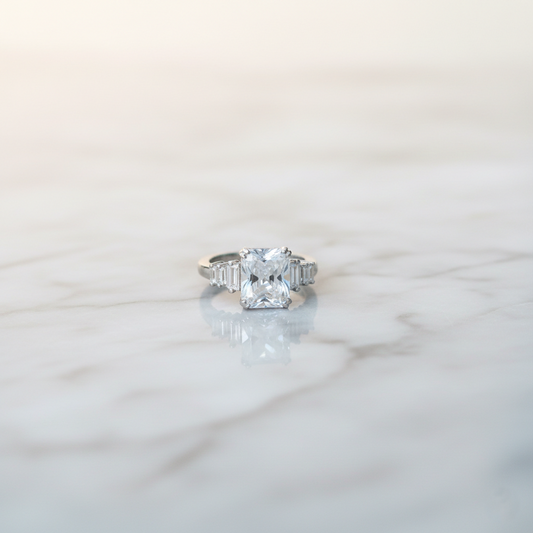 Emerald cut zircon adjustable silver luxury ring with baguette side stones