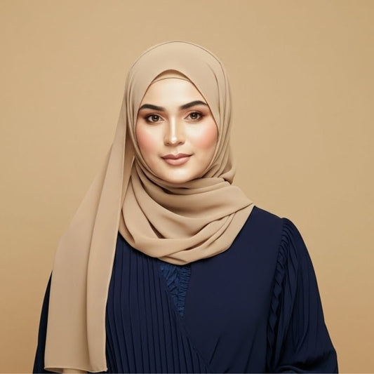 Model wearing sand georgette hijab styled with soft neutral elegance