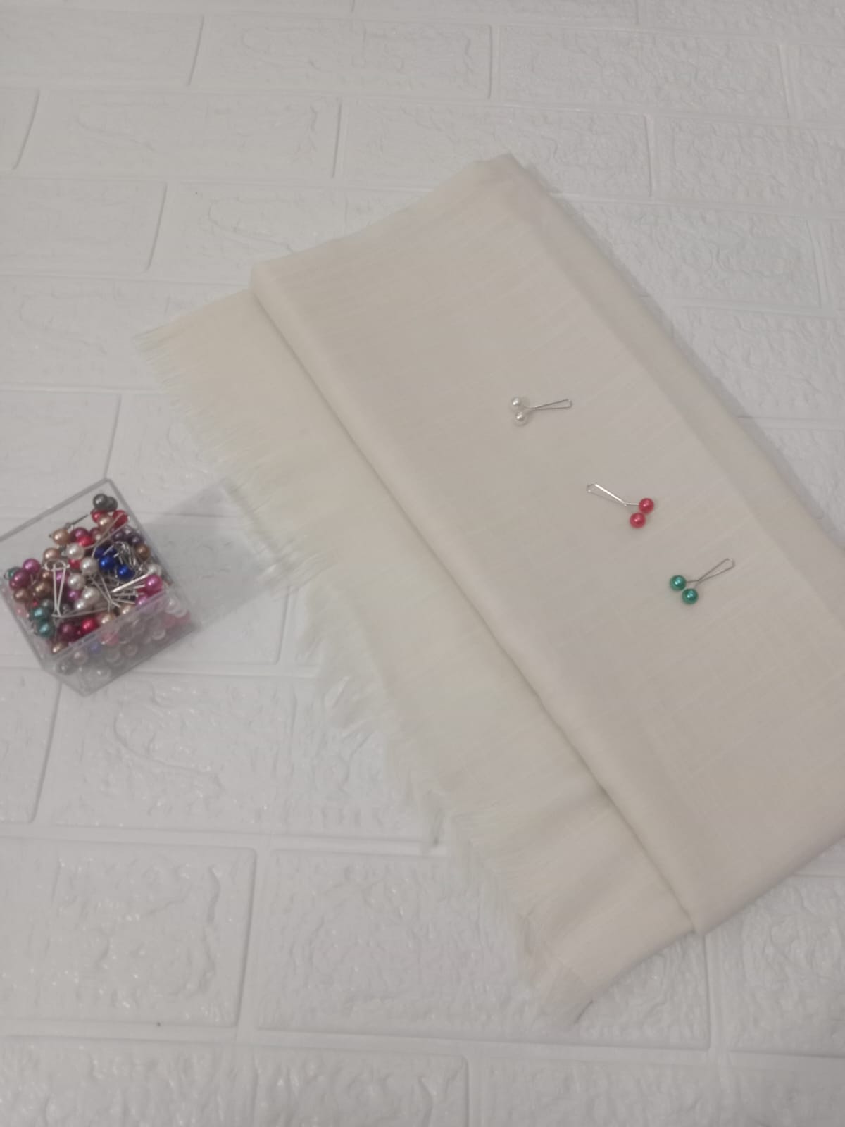 Off white Turkish lawn hijab with soft texture and elegant drape
