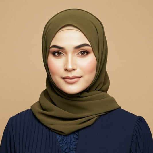 Woman wearing olive georgette hijab styled with earthy modest elegance
