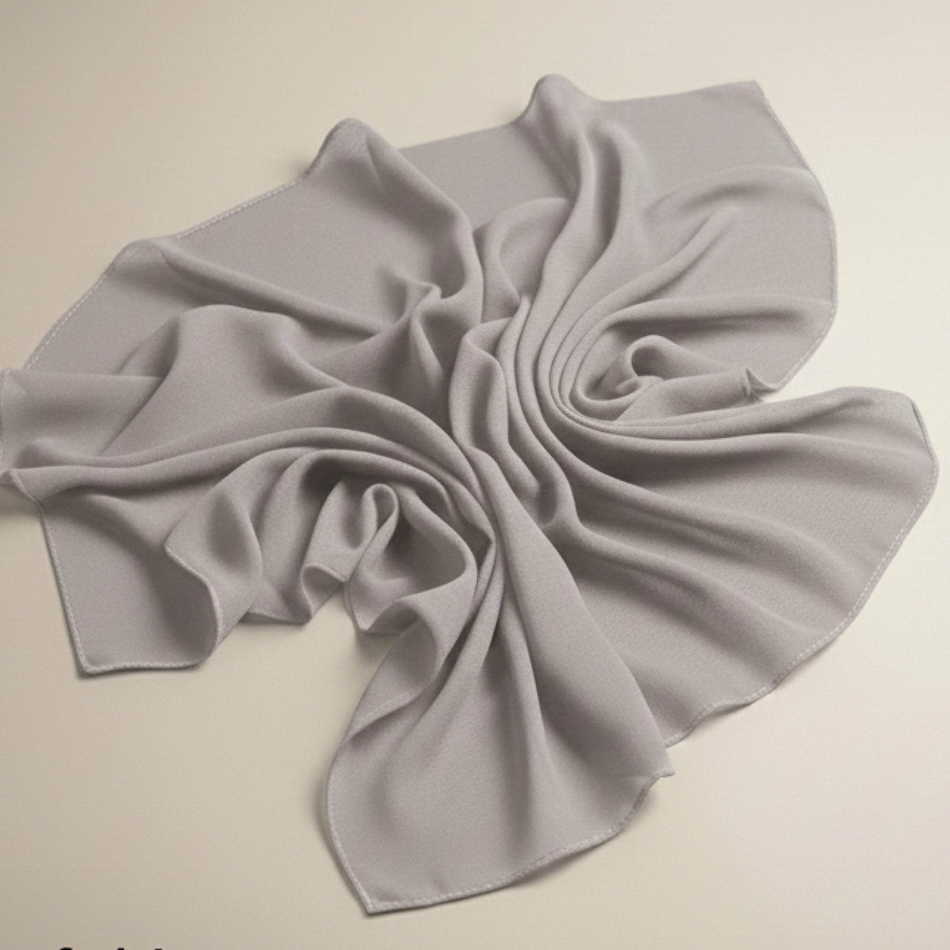 Slate gray georgette hijab fabric laid flat showcasing airy drape