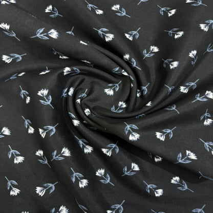 Black fabric with small white floral patterns