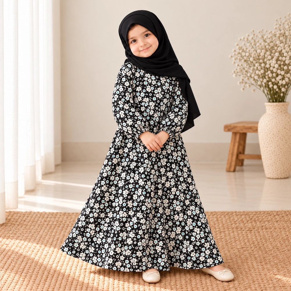 Black crepe chiffon girls’ abaya with a fine all-over light floral print