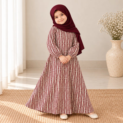 Ivory kids abaya with a repeating burgundy leaf-style print