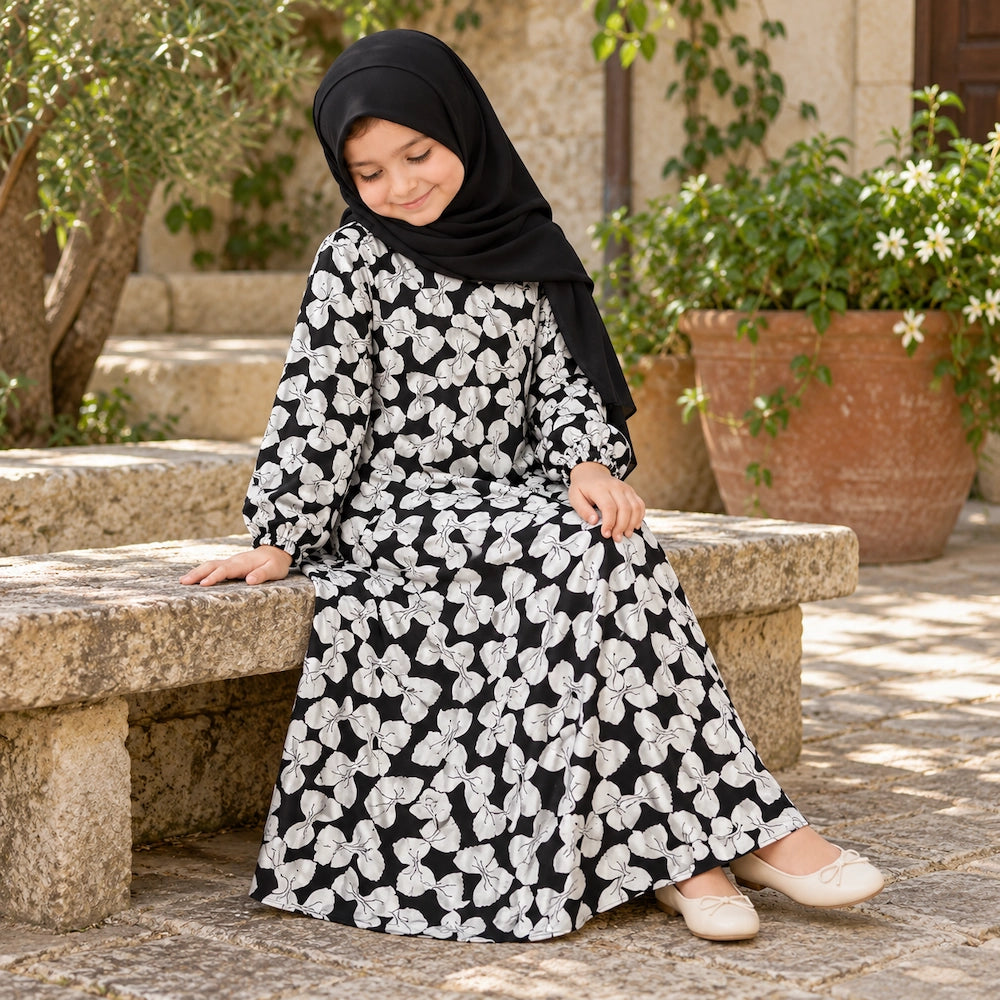 Black and white graphic print girls’ abaya in crepe chiffon with a flared silhouette