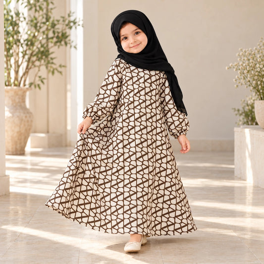 Beige girls’ abaya with a repeating brown geometric lattice print