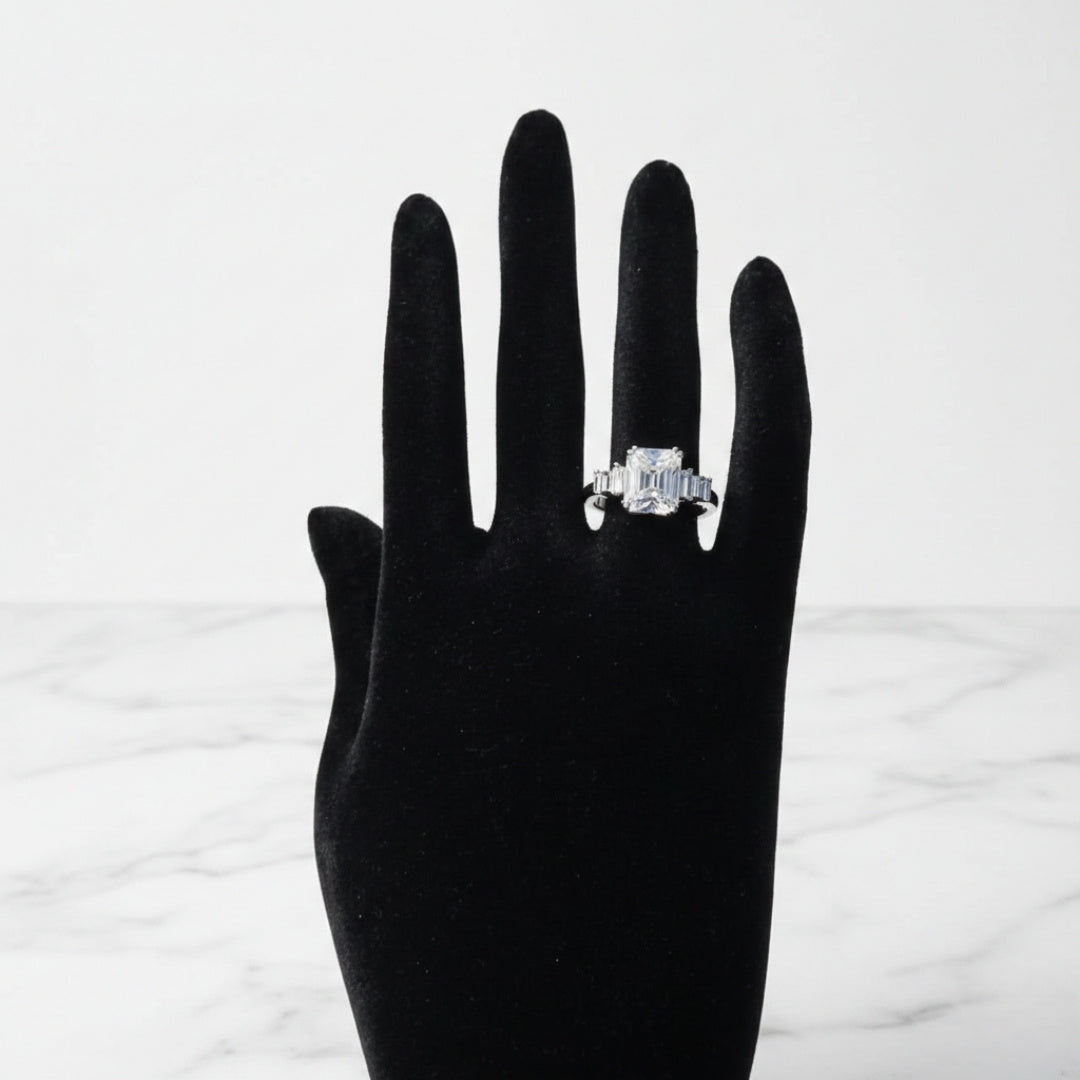 Emerald cut zircon adjustable silver luxury ring with baguette side stones
