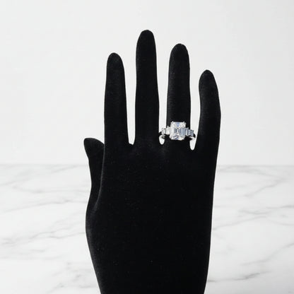 Emerald cut zircon adjustable silver luxury ring with baguette side stones

