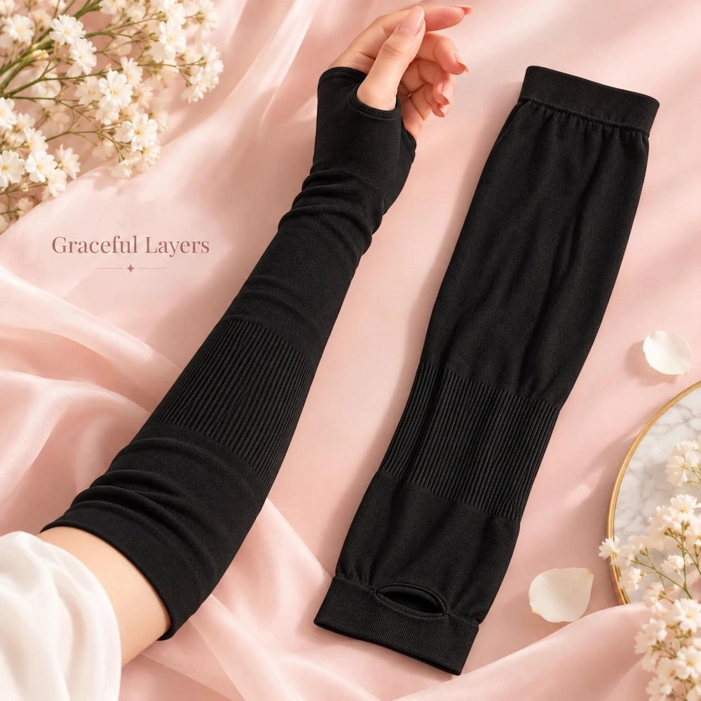 Black thumbhole arm sleeve extender with ribbed sections for layering under an abaya