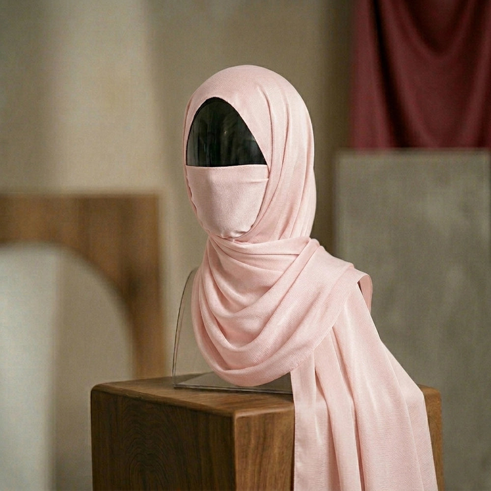 Baby pink silk hijab with soft glow elegant feminine look

