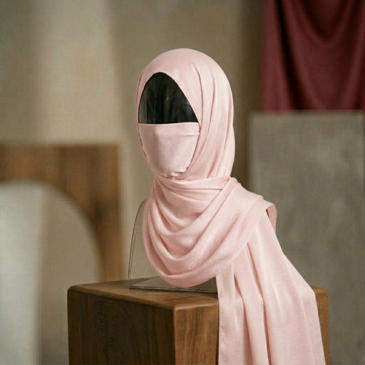 Baby pink silk hijab with soft glow elegant feminine look
