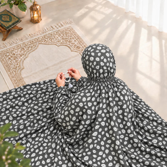 Grey women’s Namaz Chaddar with white all-over print, attached veil and elastic head grip