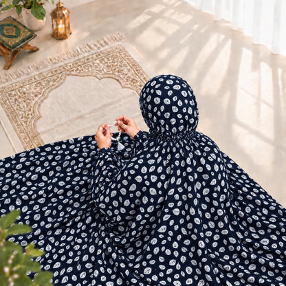 Navy blue women’s Namaz Chaddar with white print, attached veil and elastic at the back of the head