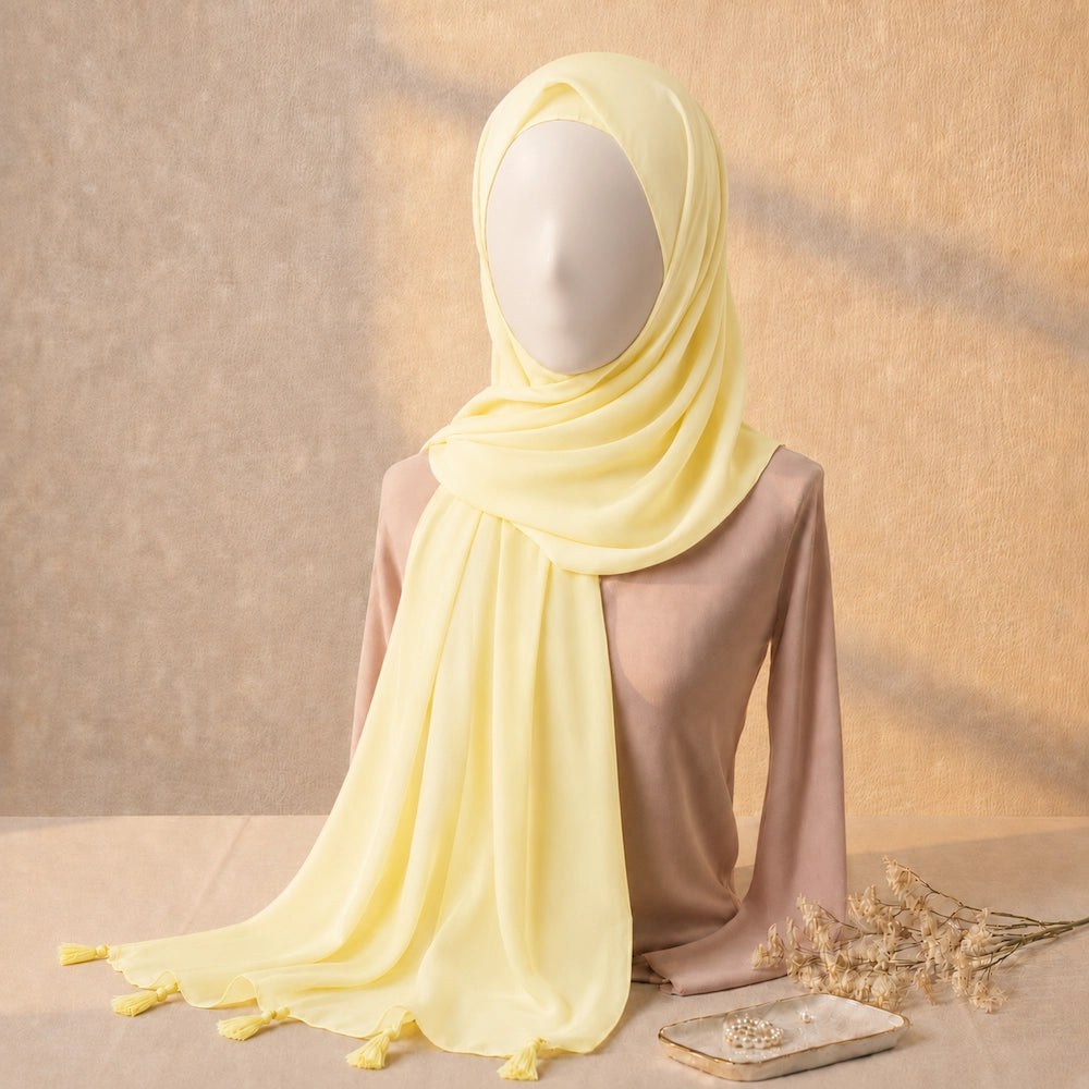 Pale yellow lawn tassel hijab with breathable lawn fabric and tassel detailing