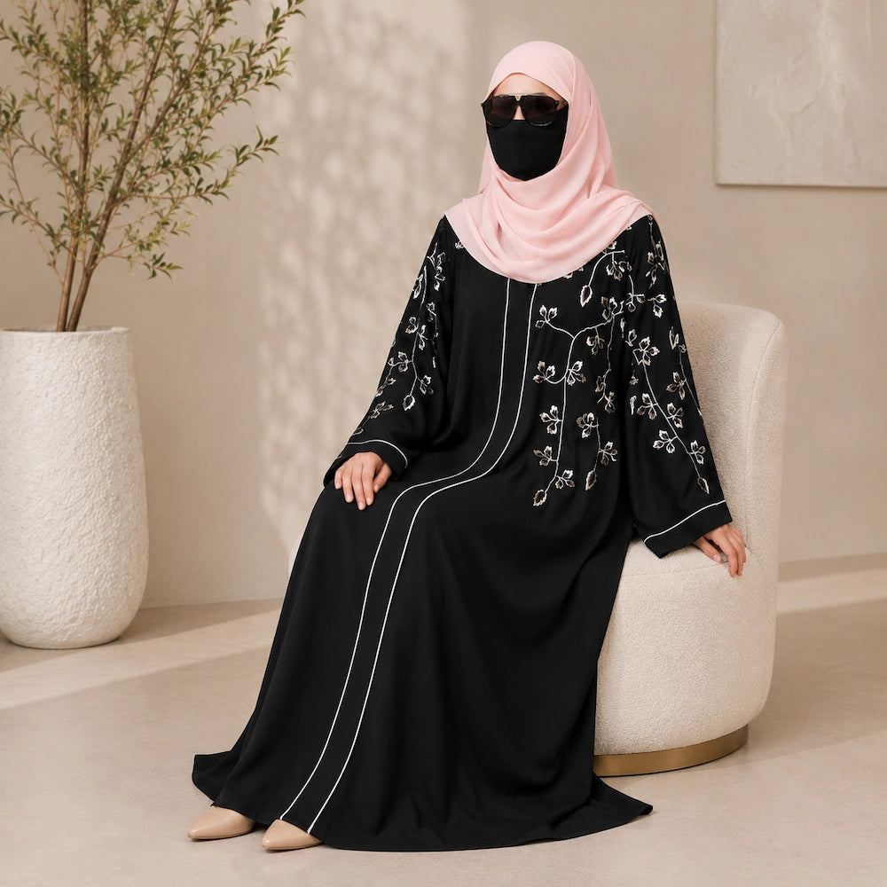 Black front open abaya with peach embroidery on sleeves front and matching embroidered hijab  