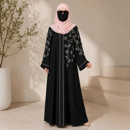 Black front open abaya with peach embroidery on sleeves front and matching embroidered hijab  