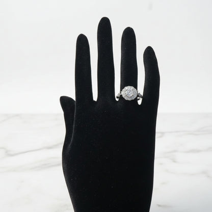 Classic halo zircon silver ring with circular center stone

