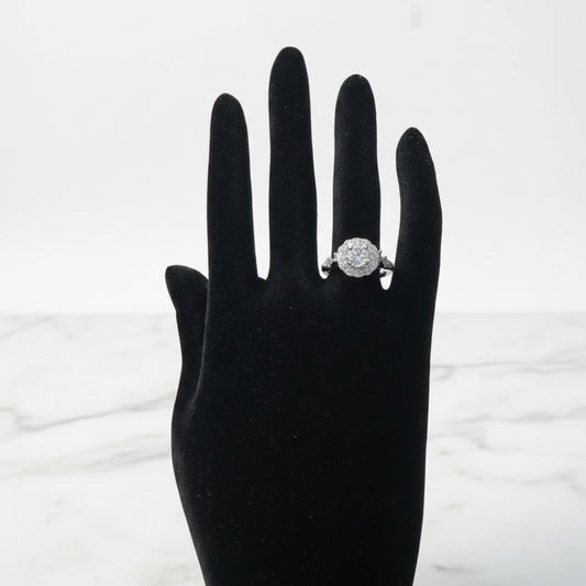 Classic halo zircon silver ring with circular center stone
