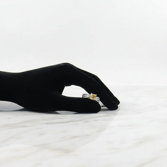 Silver yellow princess cut zircon ring with split shank pavé stones
