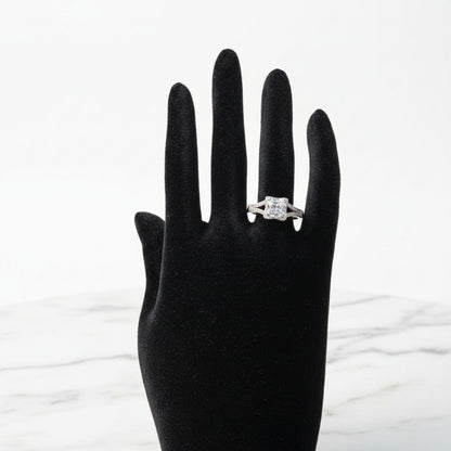 Silver princess cut halo zircon ring with split shank band and pavé stones
