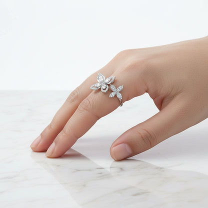 Silver floral baguette and round cut cubic zirconia statement cocktail ring

