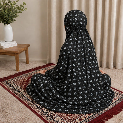 Charcoal black women's Namaz chaddar with white printed motifs and built-in veil
