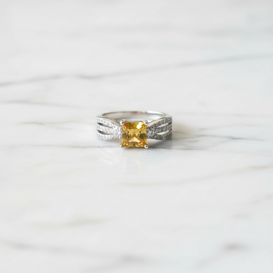 Silver yellow princess cut zircon ring with split shank pavé stones